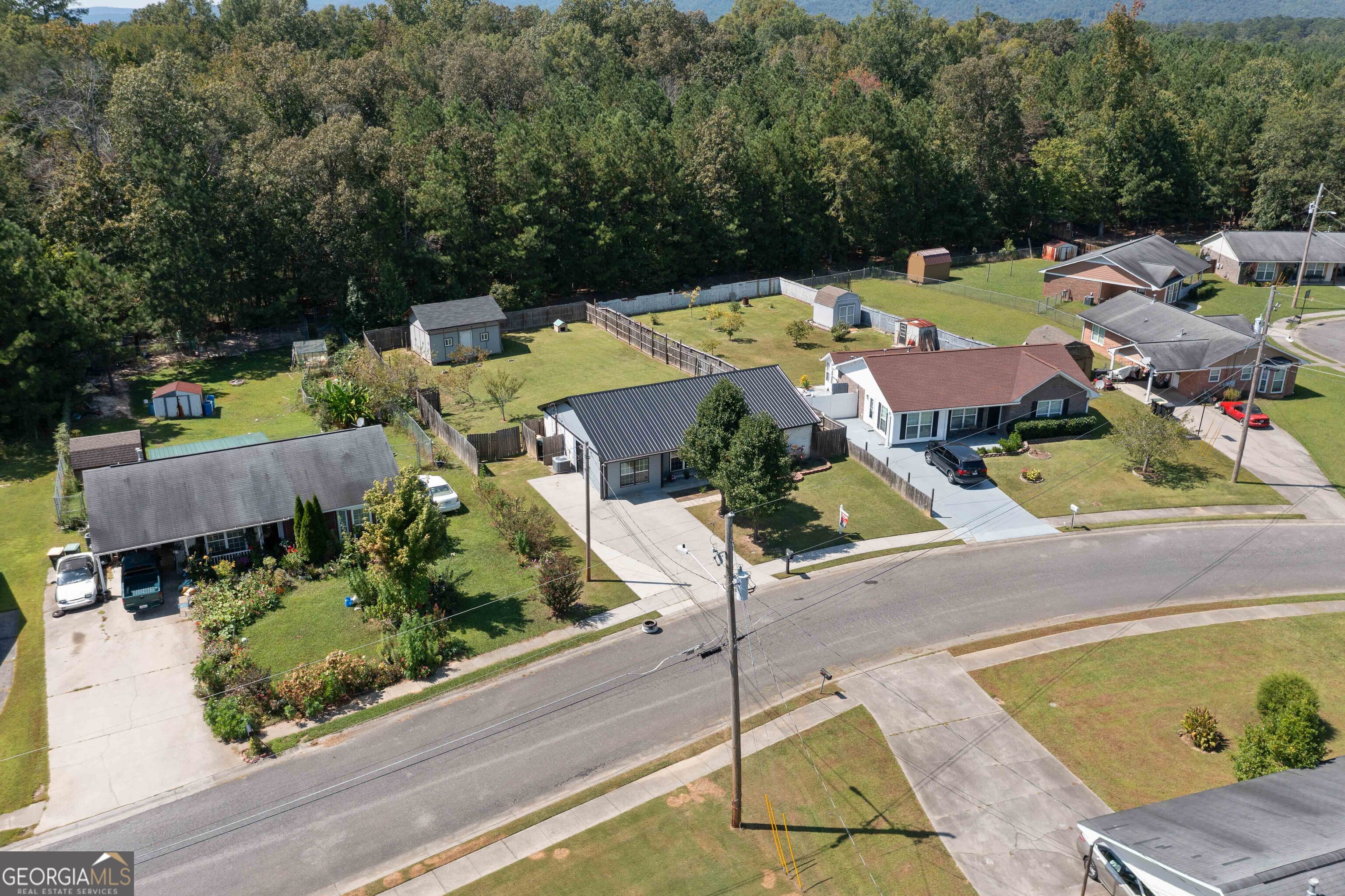 33 Northwest Hunters Glenn Road Rome, GA 30165 - Photo 38 of 43 an aerial view of a house with a swimming pool