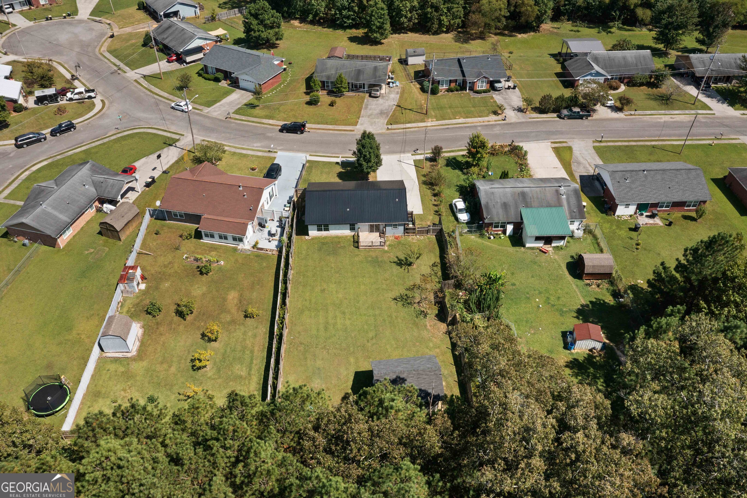 33 Northwest Hunters Glenn Road Rome, GA 30165 - Photo 39 of 43 an aerial view of a building with outdoor space