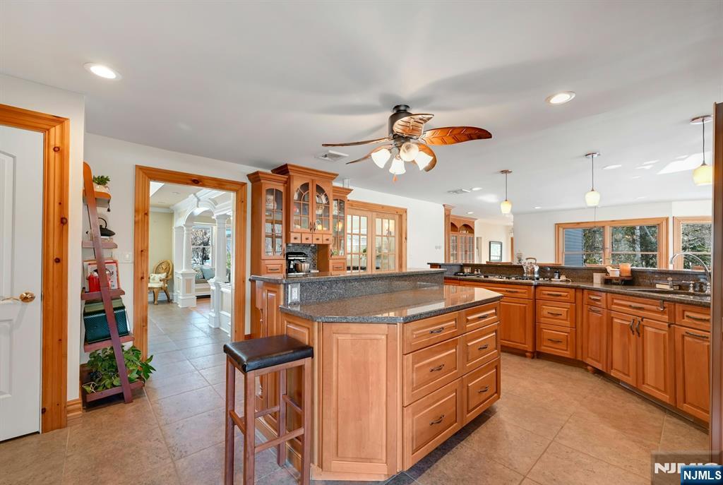 285 Chestnut Ridge Road Woodcliff Lake, NJ 07677 - Photo 22 of 46 a kitchen with stainless steel appliances granite countertop a stove and a sink