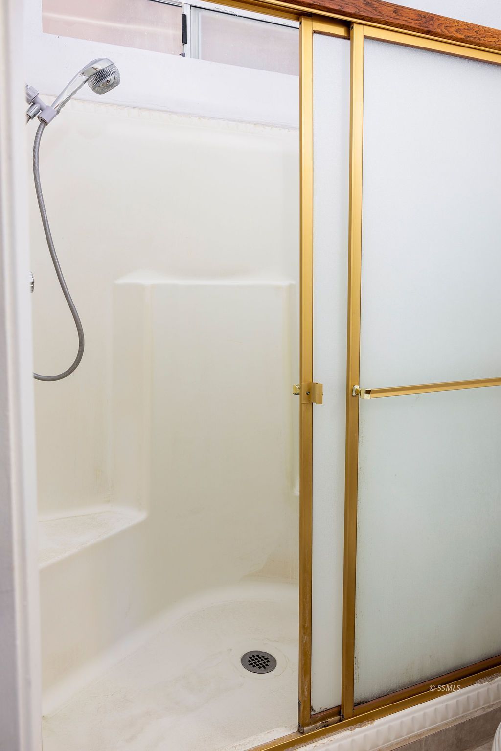 1144 West Benson Avenue Ridgecrest, CA 93555 - Photo 25 of 32 a bathroom with a glass shower door
