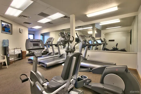 a view of a room with gym equipment