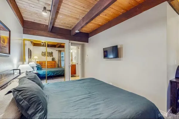 a view of a livingroom with furniture and window