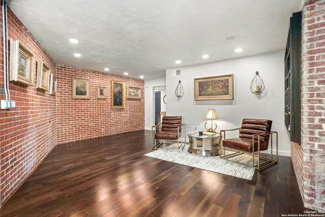 a view of a living room and dining room