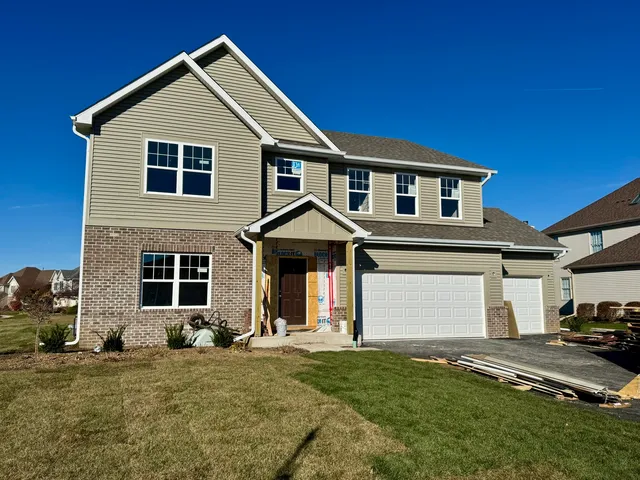 a view of a yard in front of a house