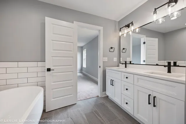 a view of an empty room with windows