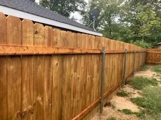 a view of outdoor space with wooden fence