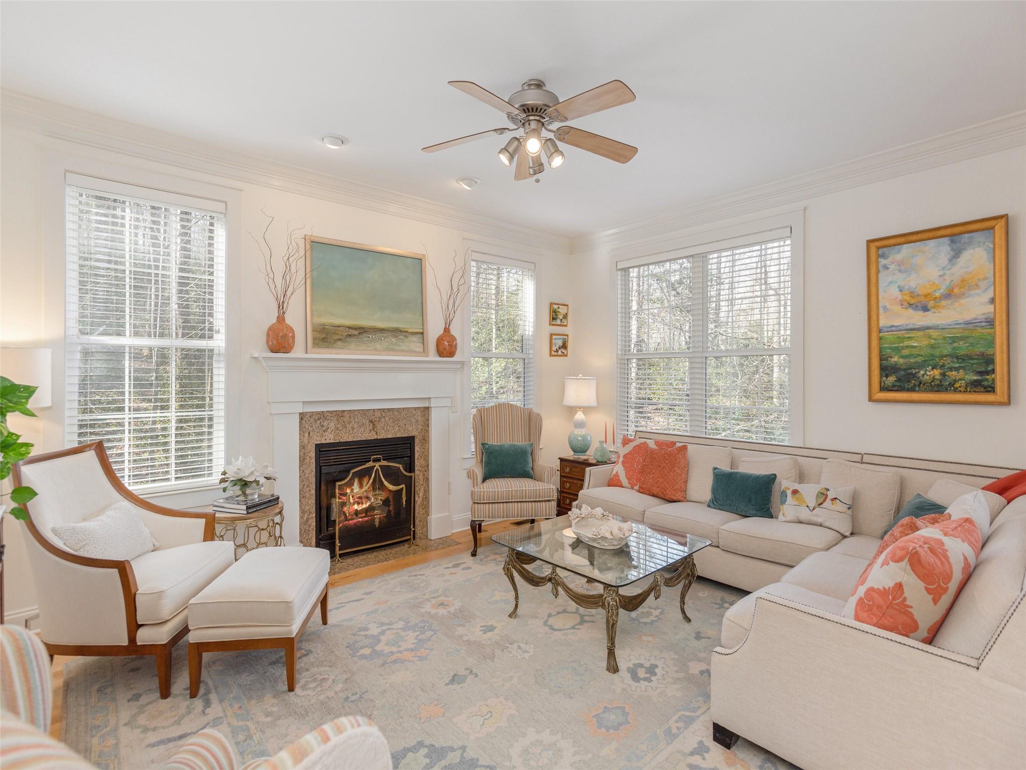 73 Cave Lane Arden, NC 28704 - Photo 12 of 45 a living room with furniture and a fireplace