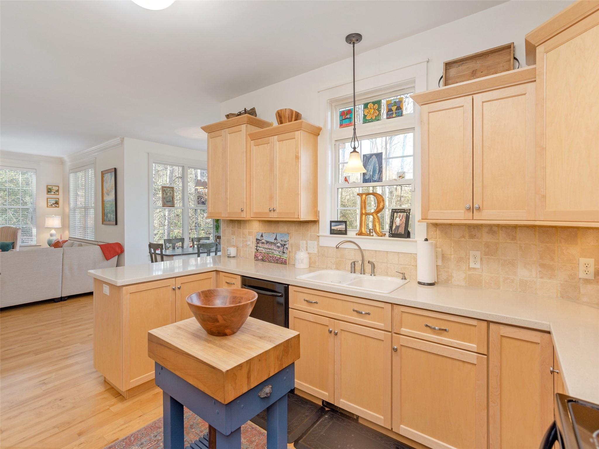 73 Cave Lane Arden, NC 28704 - Photo 20 of 45 a kitchen with a sink stove and cabinets
