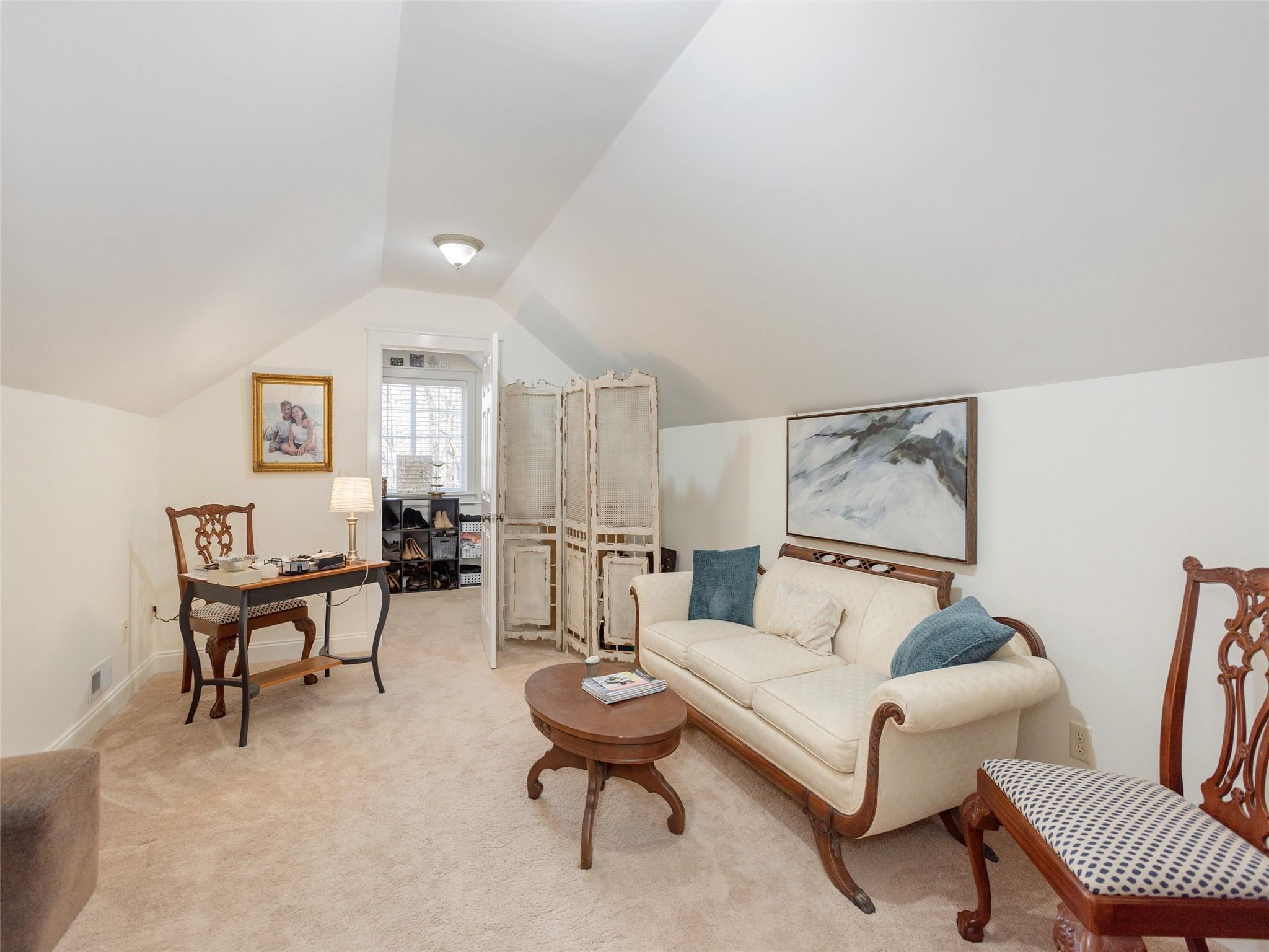73 Cave Lane Arden, NC 28704 - Photo 30 of 45 a living room with furniture and a chair