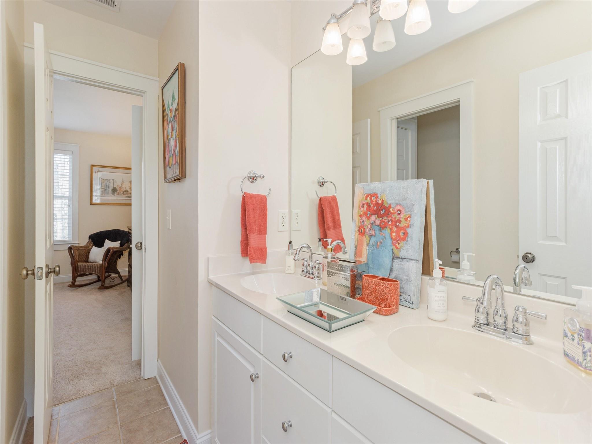 73 Cave Lane Arden, NC 28704 - Photo 32 of 45 a bathroom with a sink double vanity and a mirror
