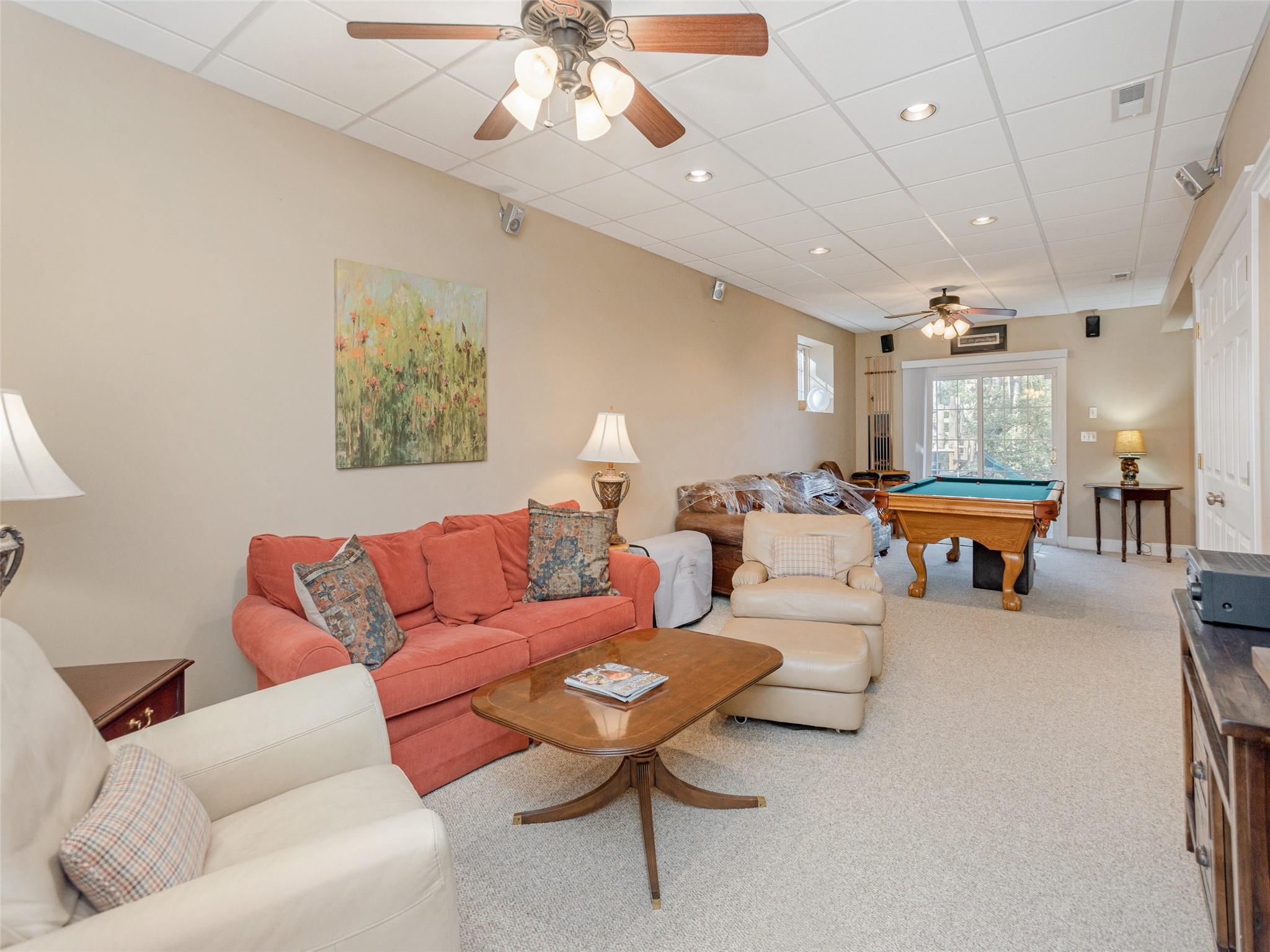 73 Cave Lane Arden, NC 28704 - Photo 36 of 45 a living room with furniture and a chandelier