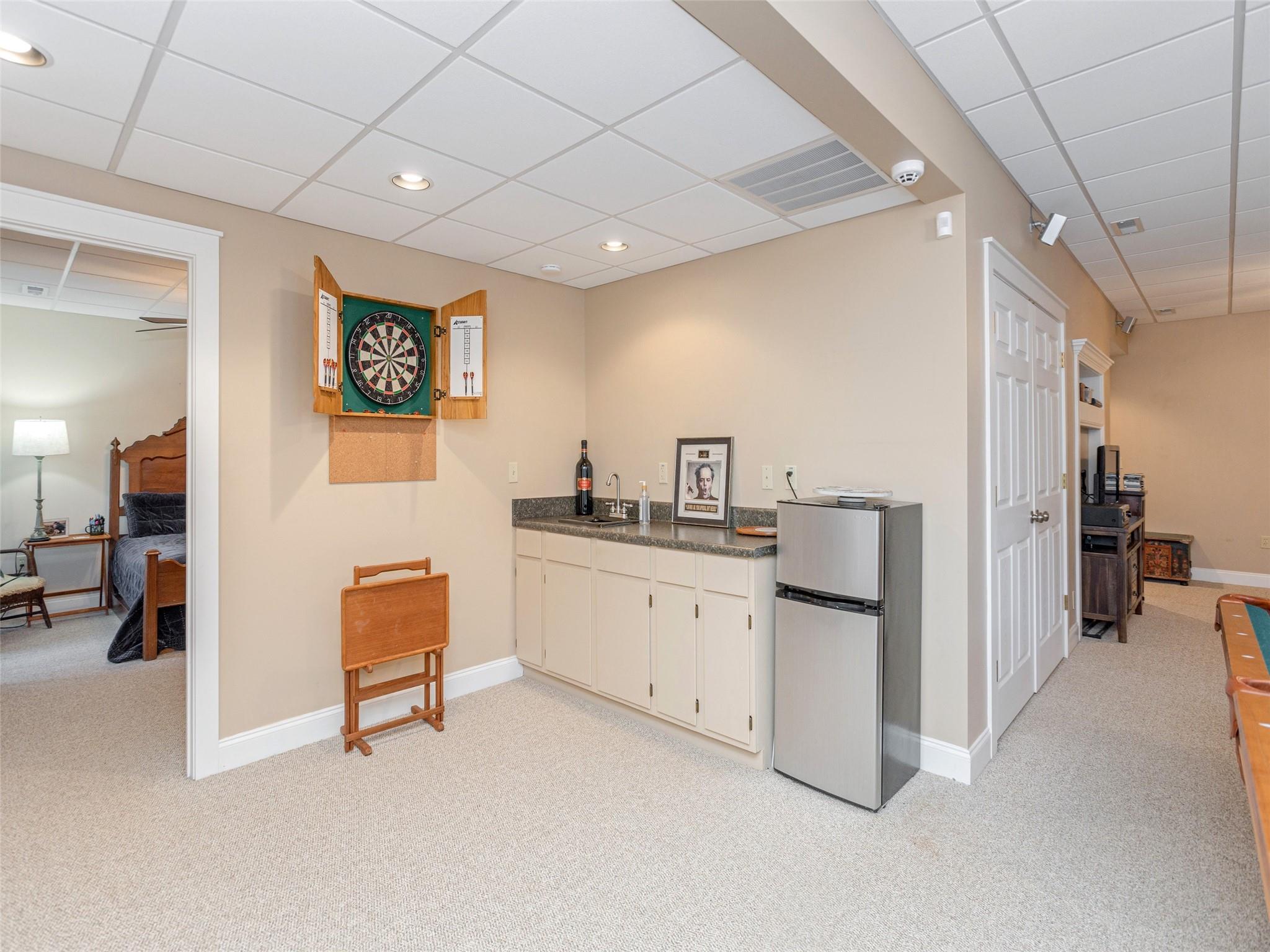 73 Cave Lane Arden, NC 28704 - Photo 38 of 45 a kitchen with furniture and a refrigerator