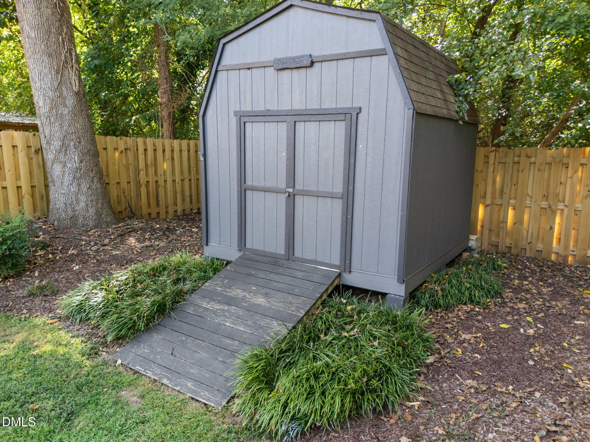 3523 Brentwood Road Raleigh, NC 27604 - Photo 10 of 43 a view of backyard with plants and trees