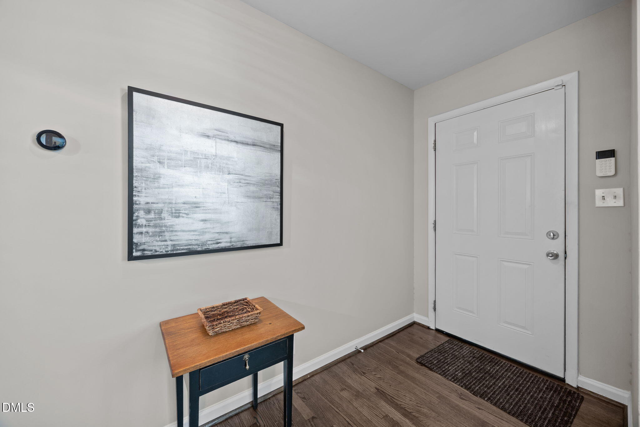 3523 Brentwood Road Raleigh, NC 27604 - Photo 12 of 43 a view of a workspace with furniture and wooden floor
