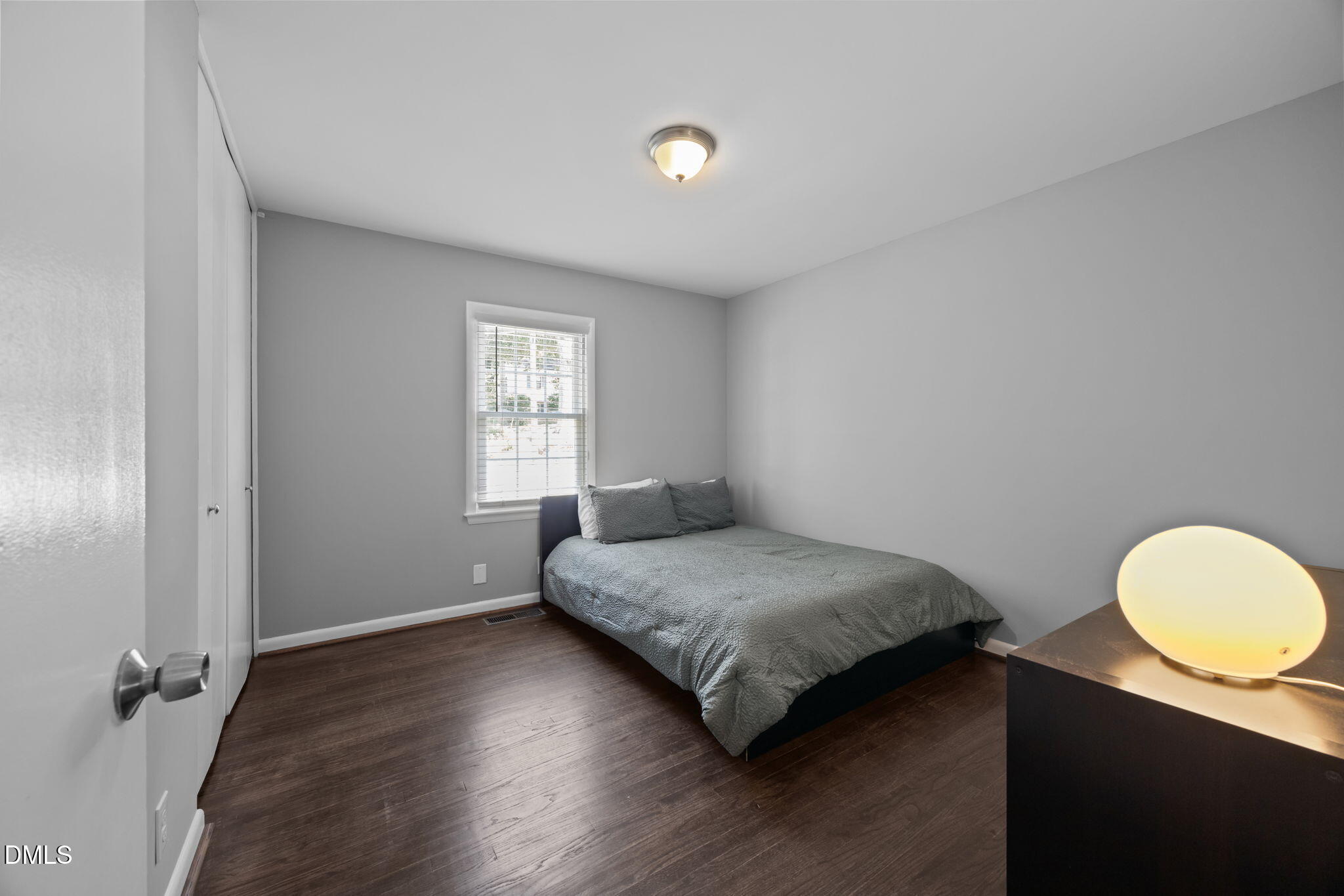 3523 Brentwood Road Raleigh, NC 27604 - Photo 24 of 43 a bedroom with a bed and a window