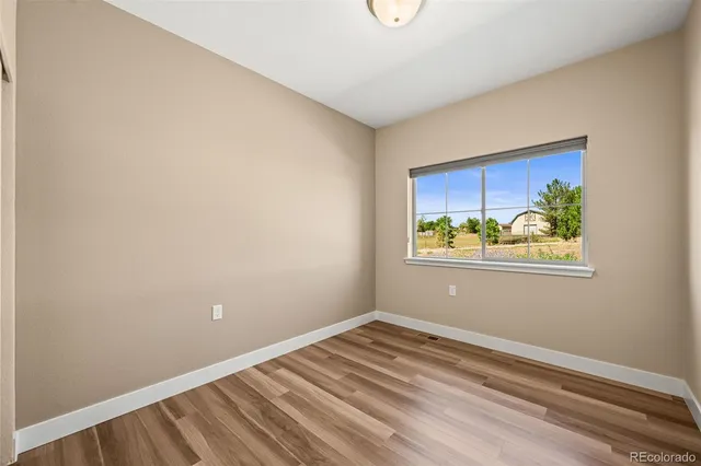 an empty room with window