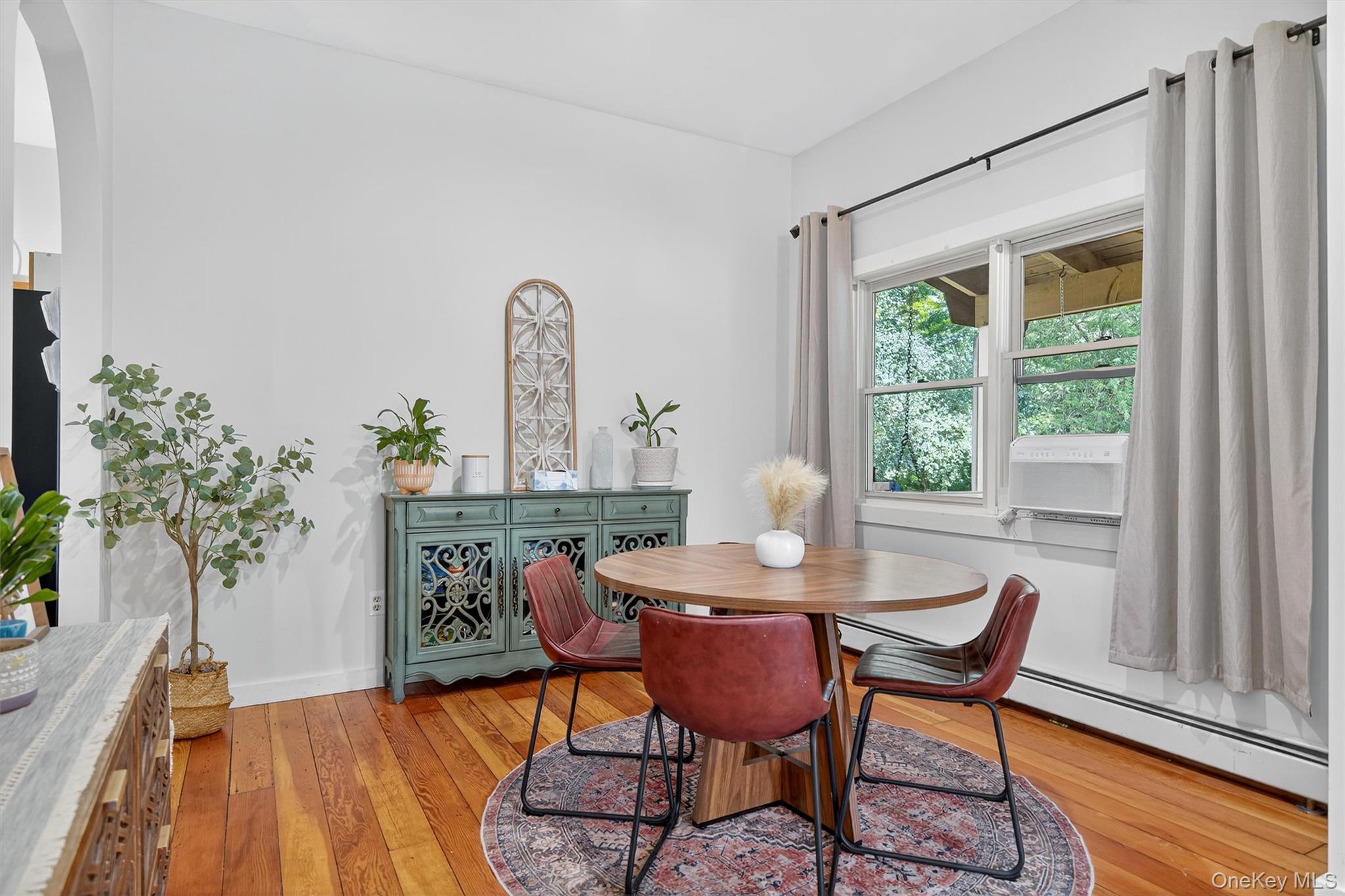 321 Bellvale Lakes Road Warwick, NY 10990 - Photo 12 of 33 a dining room with furniture and wooden floor