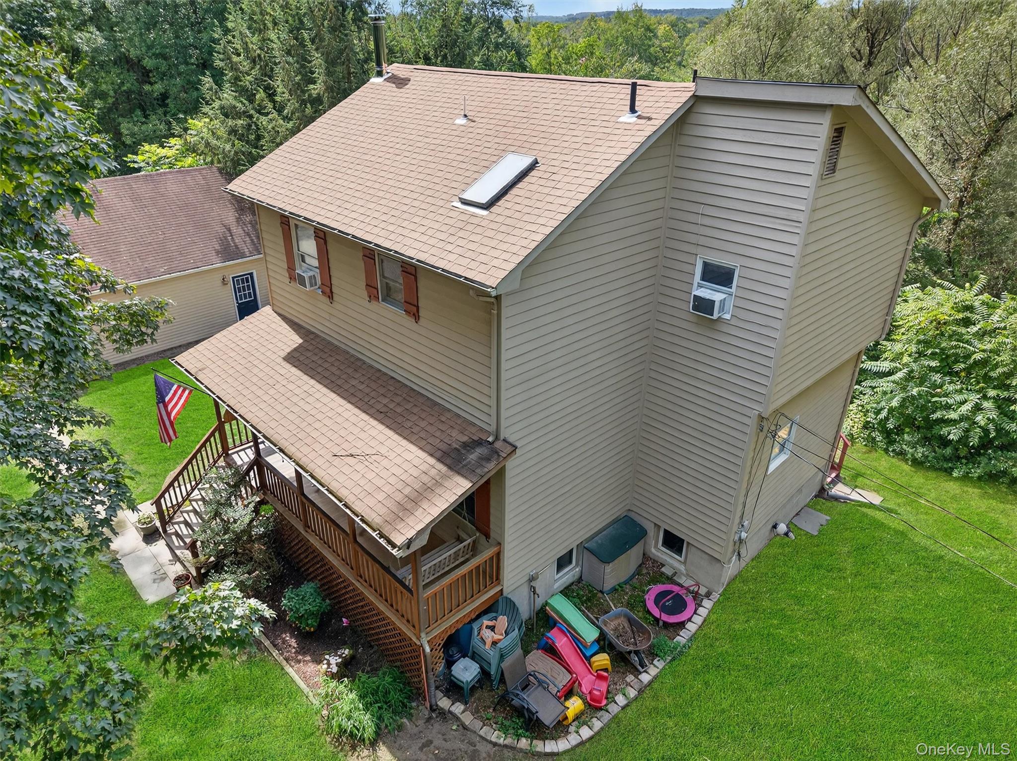 321 Bellvale Lakes Road Warwick, NY 10990 - Photo 30 of 33 a aerial view of a house with a yard