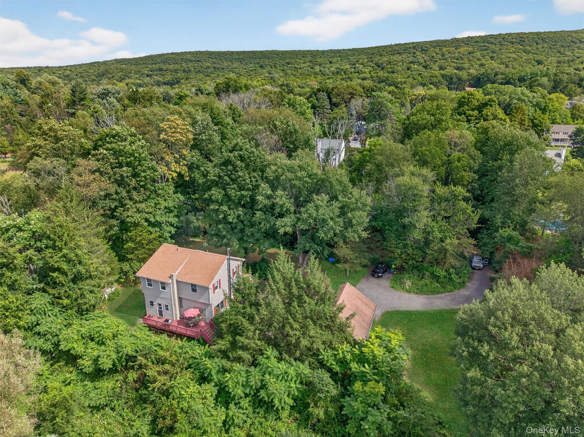 321 Bellvale Lakes Road Warwick, NY 10990 - Photo 32 of 33 an aerial view of a house with a yard