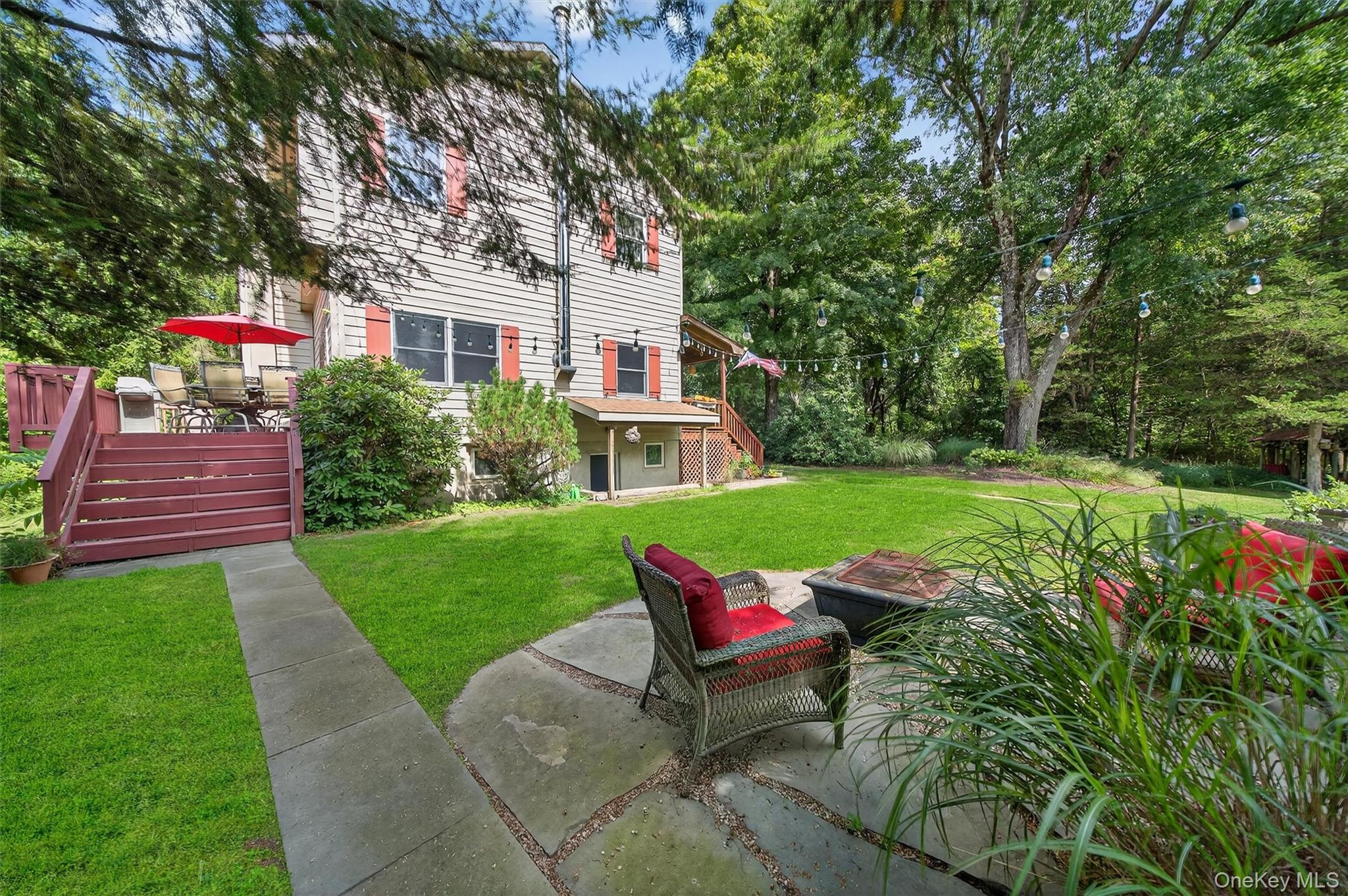 321 Bellvale Lakes Road Warwick, NY 10990 - Photo 5 of 33 a view of a house with a yard porch and sitting area