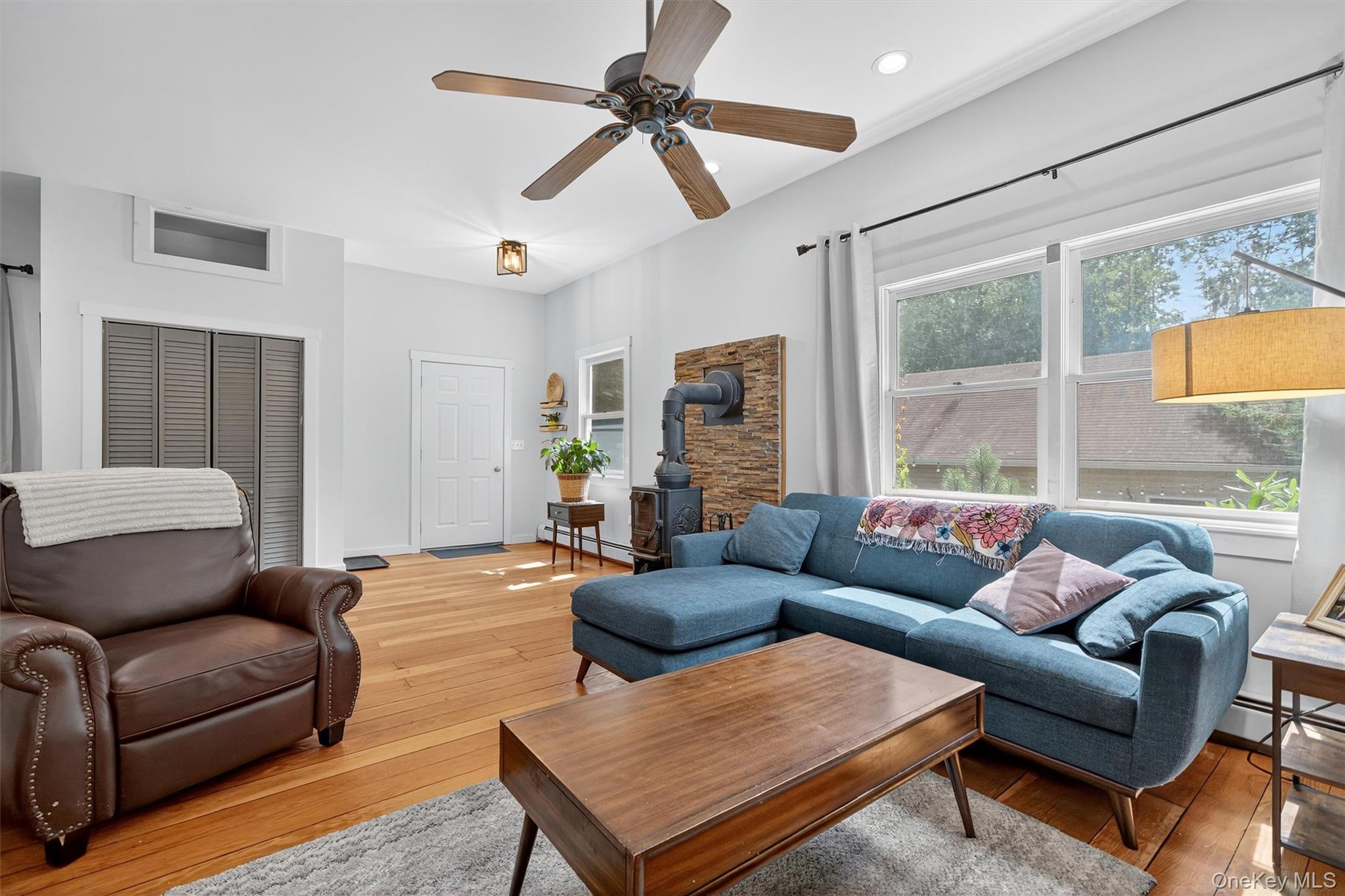 321 Bellvale Lakes Road Warwick, NY 10990 - Photo 9 of 33 a living room with furniture and a large window
