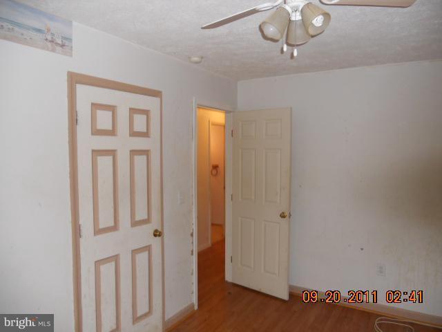 14331 Snake Castle Road Sumerduck, VA 22742 - Photo 8 of 11 a view of a hallway with chandelier