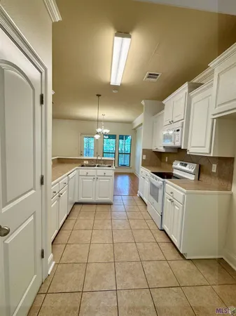 $183,900 | 24345 Chateau De Chene Boulevard, Unit 15, Walker, LA 70785