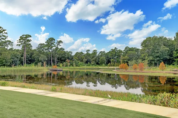 a view of a lake with a big yard
