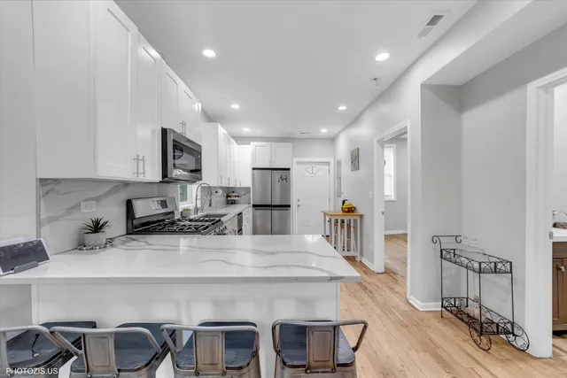 $449,000 | 8404 South Exchange Avenue, Chicago, IL 60617