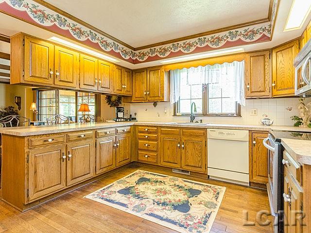 6779 West Munger Road Onsted, MI 49265 - Photo 30 of 46 upper level kitchen