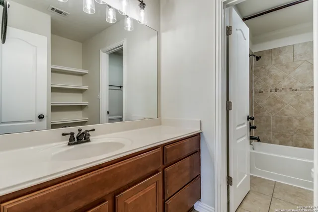 a bathroom with a sink and a bathtub