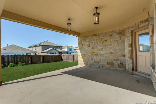 a view of a yard in front of a house
