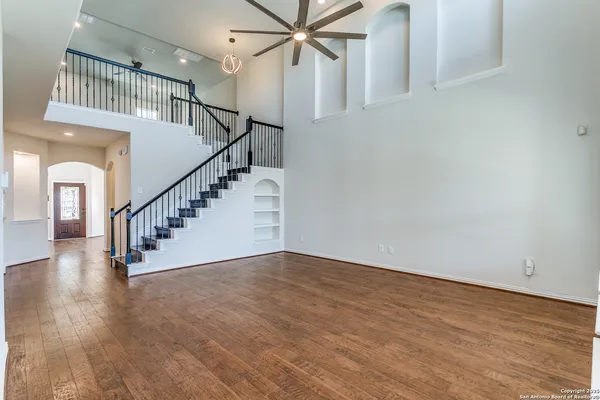 a view of entryway with wooden floor