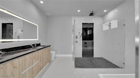 a bathroom with a bathtub and a sink