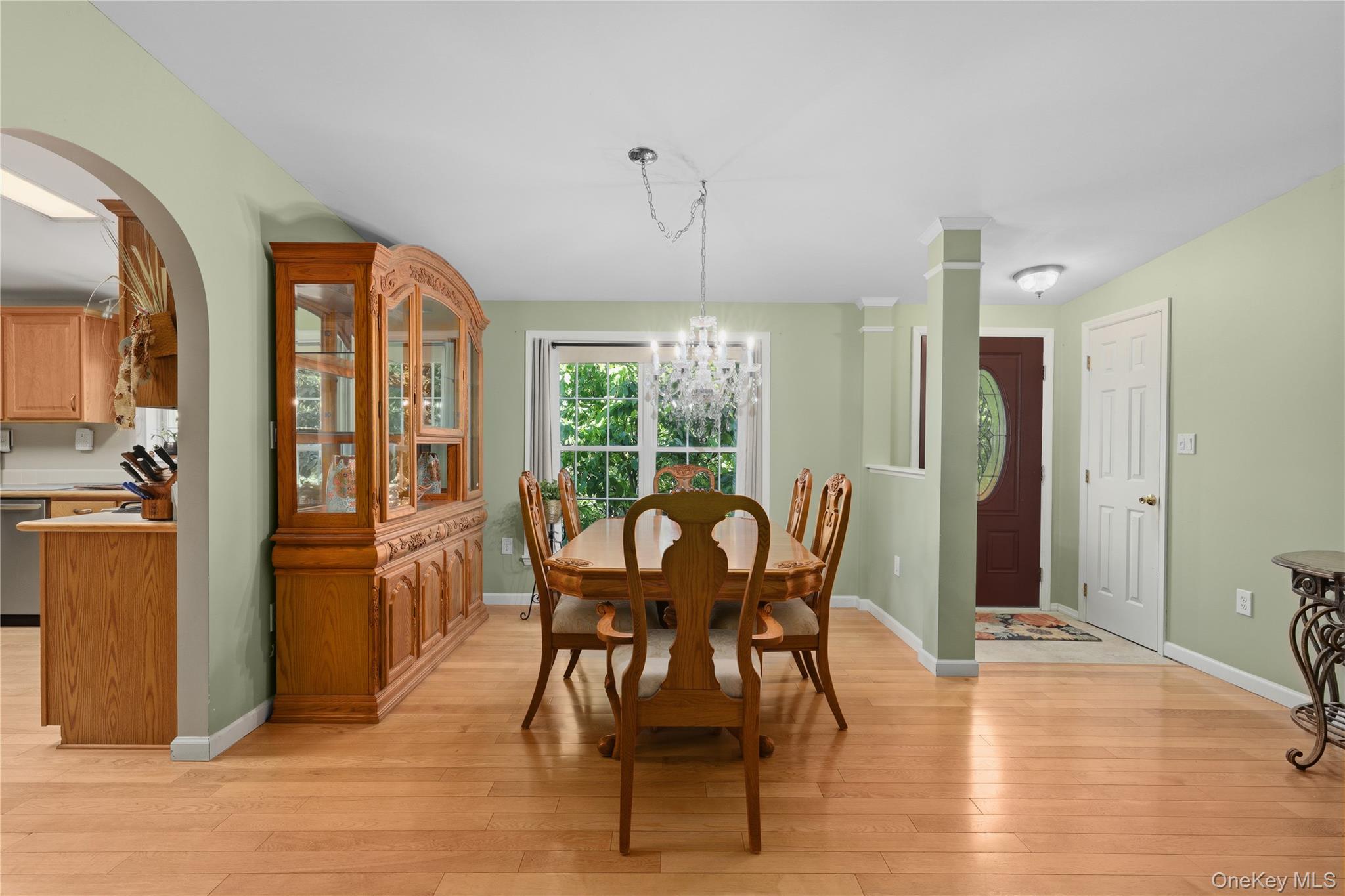 590 Farm To Market Road Brewster, NY 10509 - Photo 8 of 32 a view of a dining room with furniture window and wooden floor