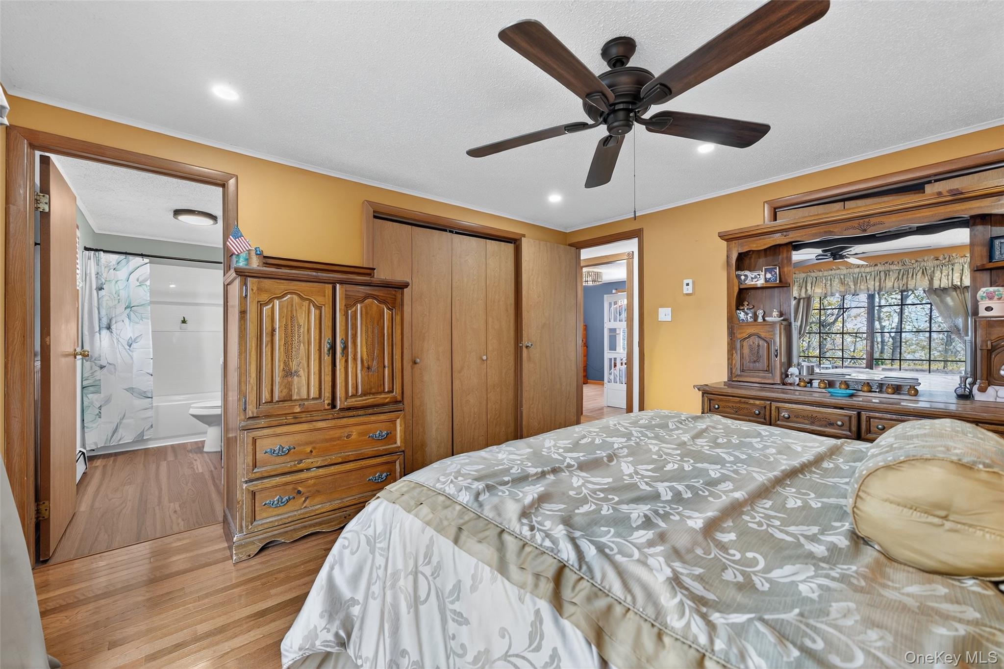 7 Colleen Lane Wallkill, NY 12589 - Photo 23 of 39 Bedroom featuring ornamental molding, light wood finished floors, a closet, ceiling fan, and recessed lighting
