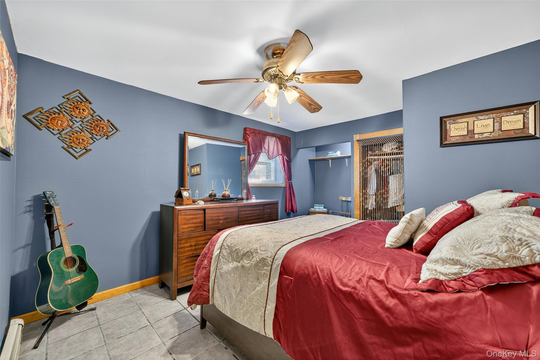 7 Colleen Lane Wallkill, NY 12589 - Photo 32 of 39 Bedroom featuring tile patterned floors, a ceiling fan, and a baseboard radiator