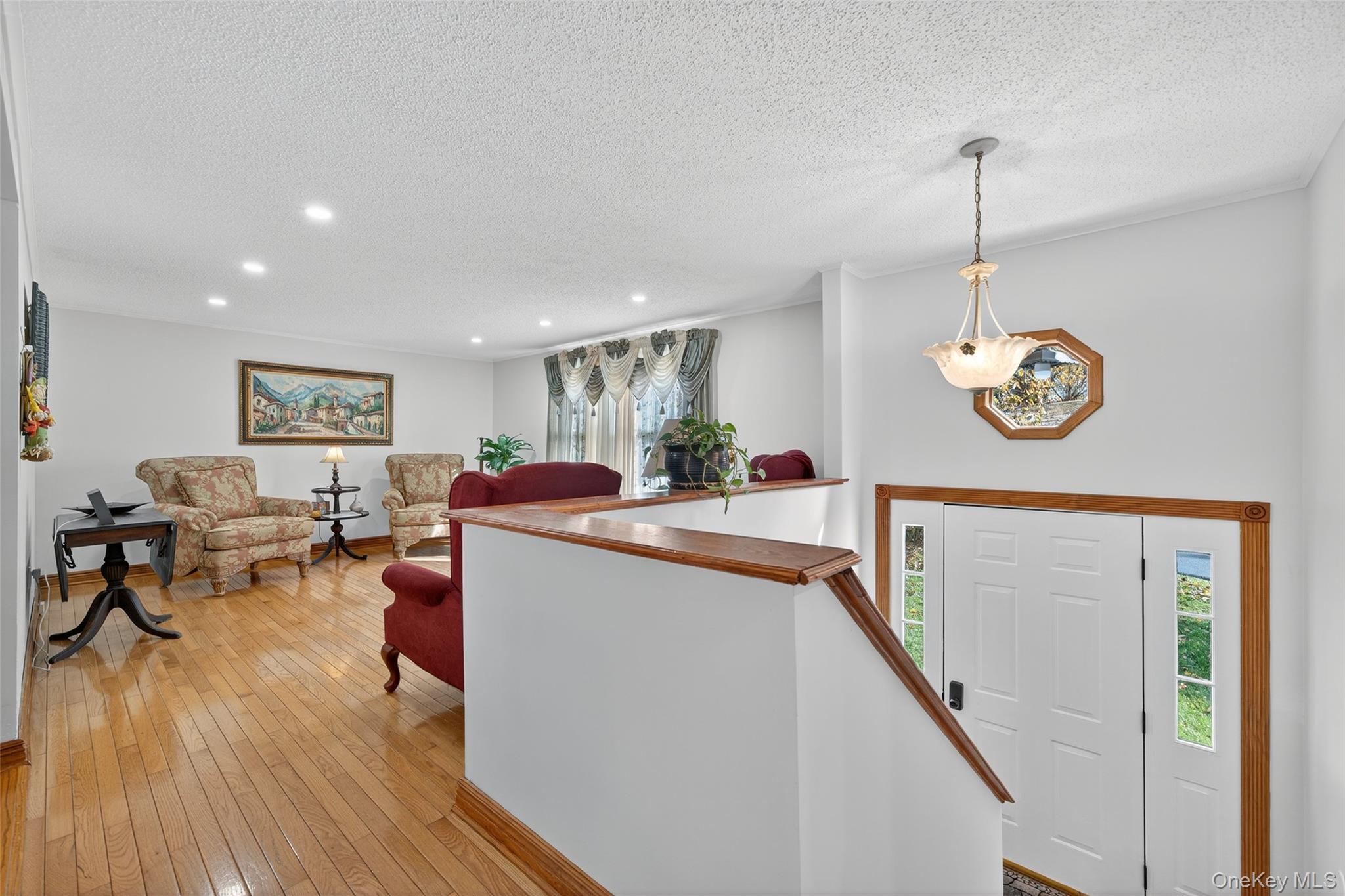 7 Colleen Lane Wallkill, NY 12589 - Photo 7 of 39 Foyer entrance featuring recessed lighting, light wood-style flooring, and a textured ceiling