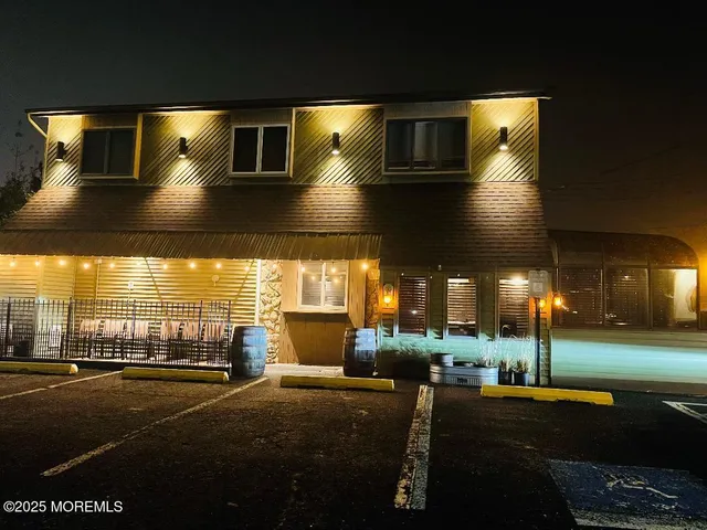 a view of a building with yard