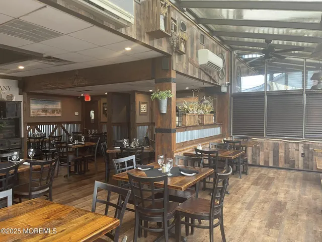 a view of a two chairs in a balcony