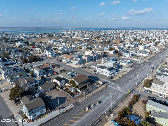 a aerial view of a building with street