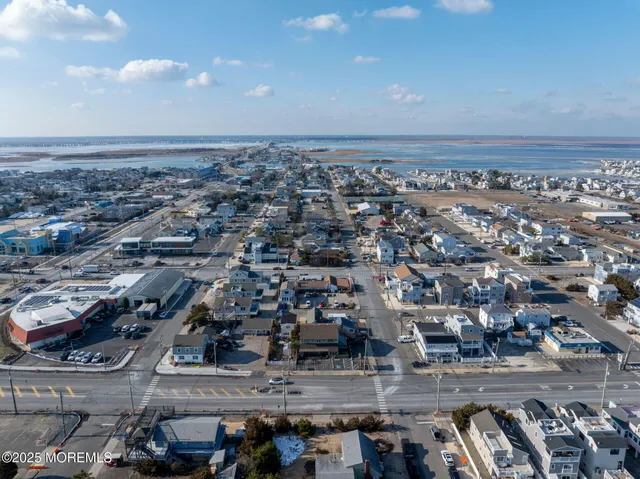 an aerial view of a building with outdoor space