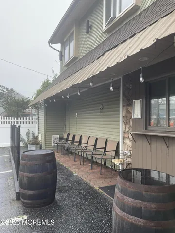 a back view of porch with seating space
