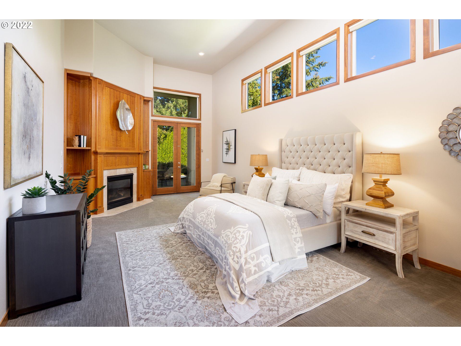 6228 Northwest El Rey Drive Camas, WA 98607 - Photo 14 of 32 a bedroom with a bed and wooden furniture