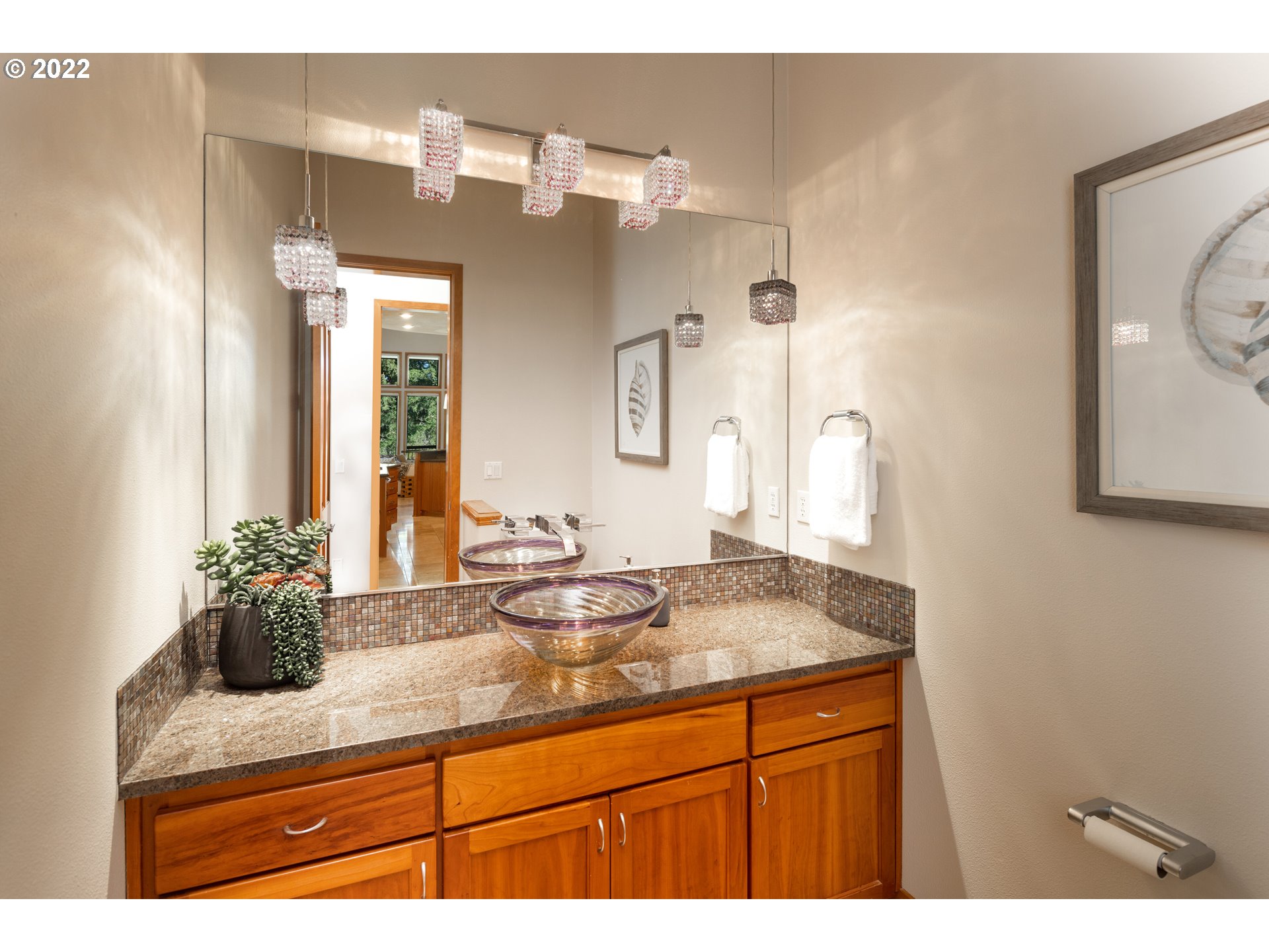 6228 Northwest El Rey Drive Camas, WA 98607 - Photo 18 of 32 a bathroom with a granite countertop sink and a mirror