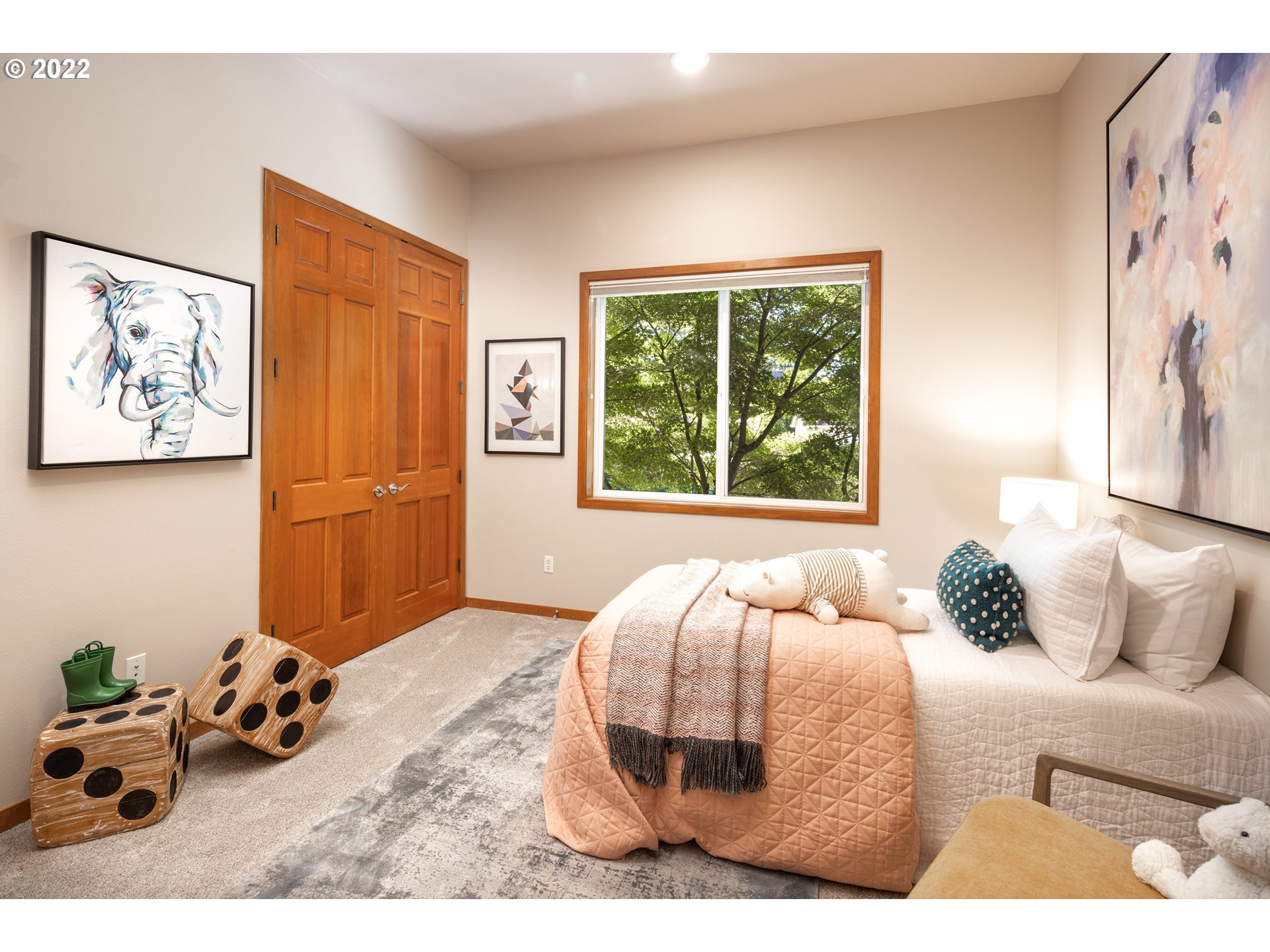 6228 Northwest El Rey Drive Camas, WA 98607 - Photo 21 of 32 a bedroom with a bed and a painting on the wall