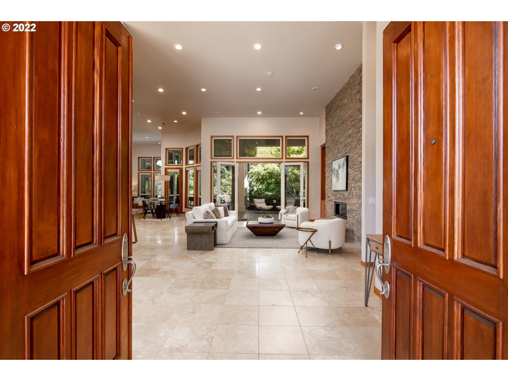 6228 Northwest El Rey Drive Camas, WA 98607 - Photo 4 of 32 a living room with furniture a large window and chandelier
