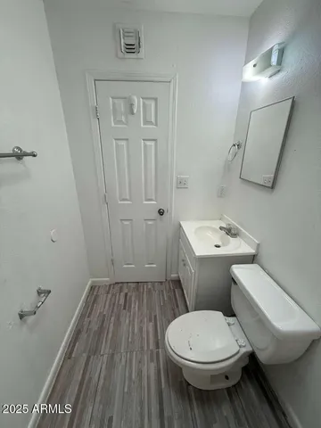 a bathroom with a sink and a toilet