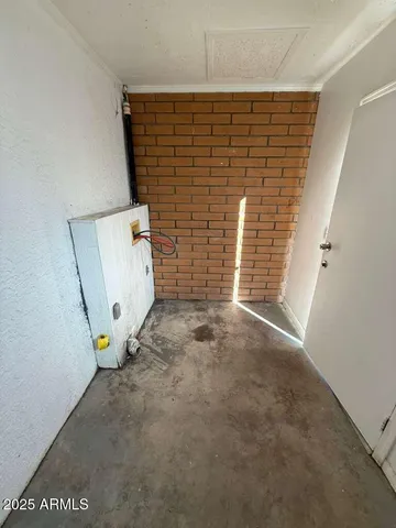 an empty room with a hallway