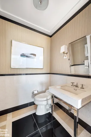 a kitchen that has a lot of cabinets in it